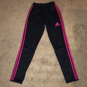Pink and black Adidas sweat pants
